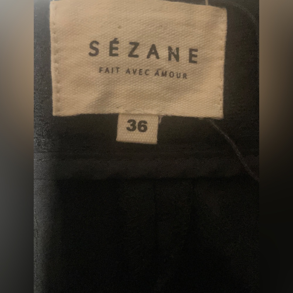 Sézane black tailored trousers feature a high-rise waist straight-leg silhouette
